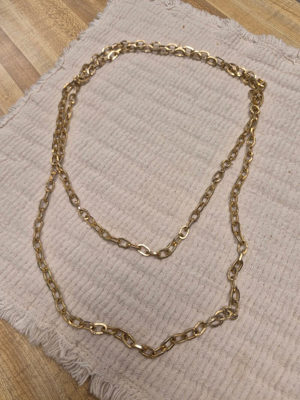 Long gold necklace